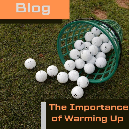 Close up image of golf range balls poured on to a tee box and text "The Importance of Warming Up"