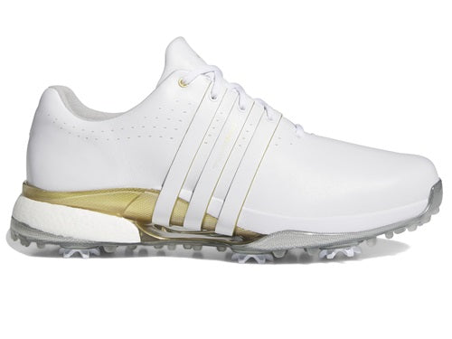 White golf shoe with gold accents on a white background