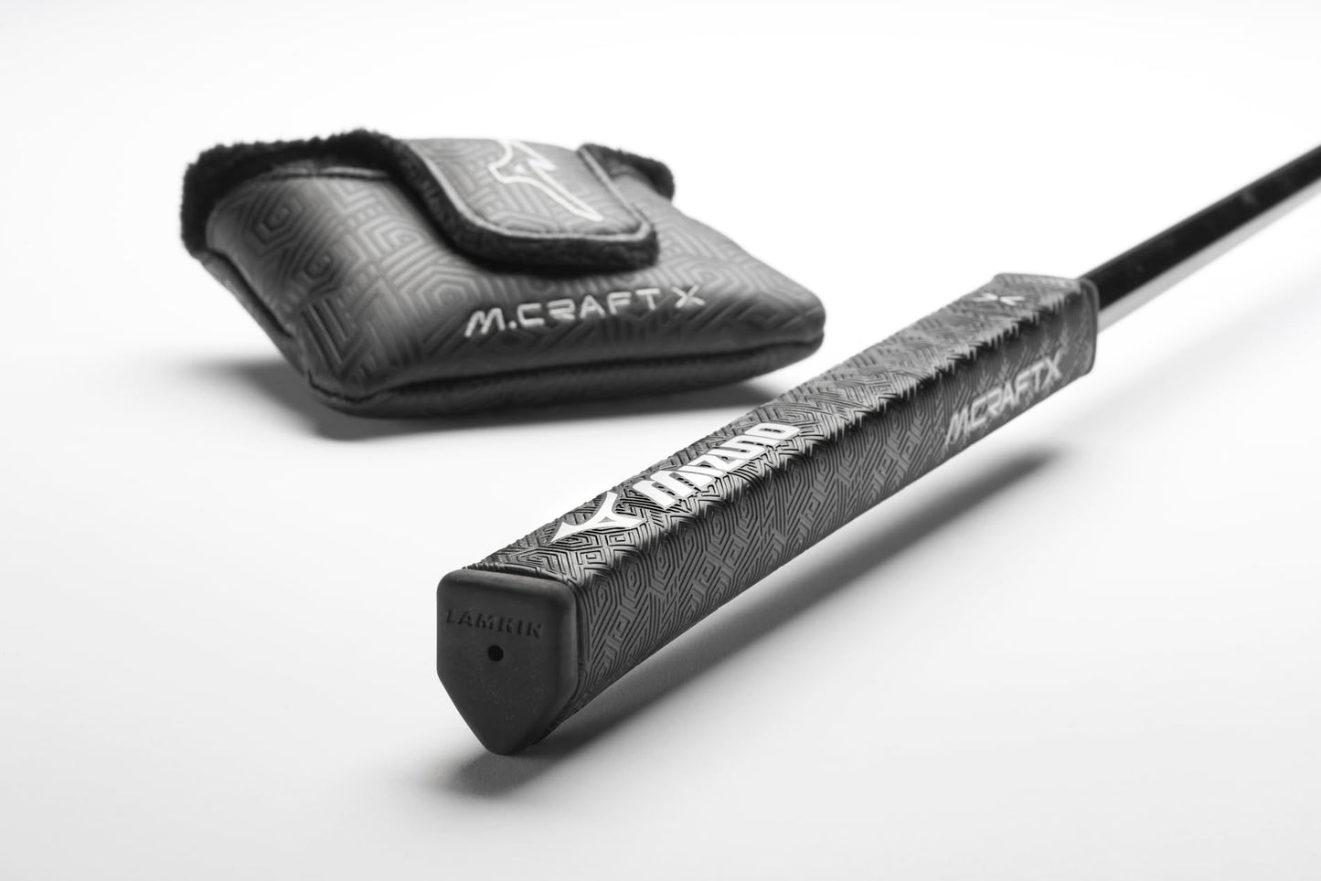 Product image of Mizuno M Craft X golf putter grip and headcover on a white background