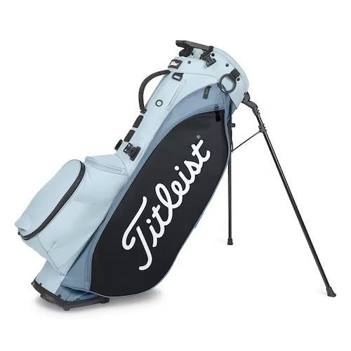 Light blue and black Titleist golf bag on a white background