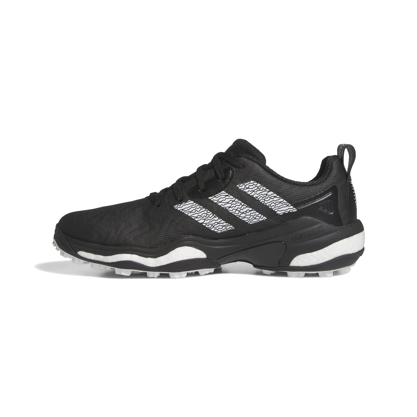 Black Adidas shoe with white sole on a white background
