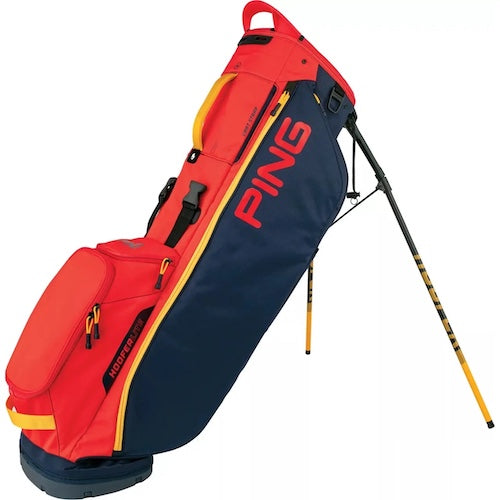 Red and blue golf bag with 'PING' branding on a white background