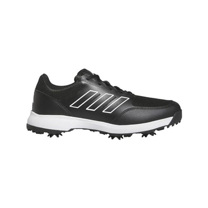 Black Adidas golf shoe with white sole on a white background