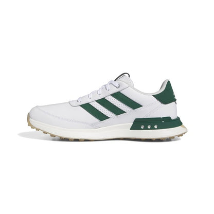 White Adidas sneaker with green stripes on a white background