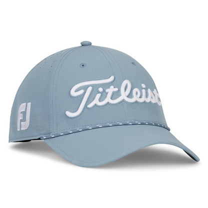 A blue Titleist hat with white stitching on a white background