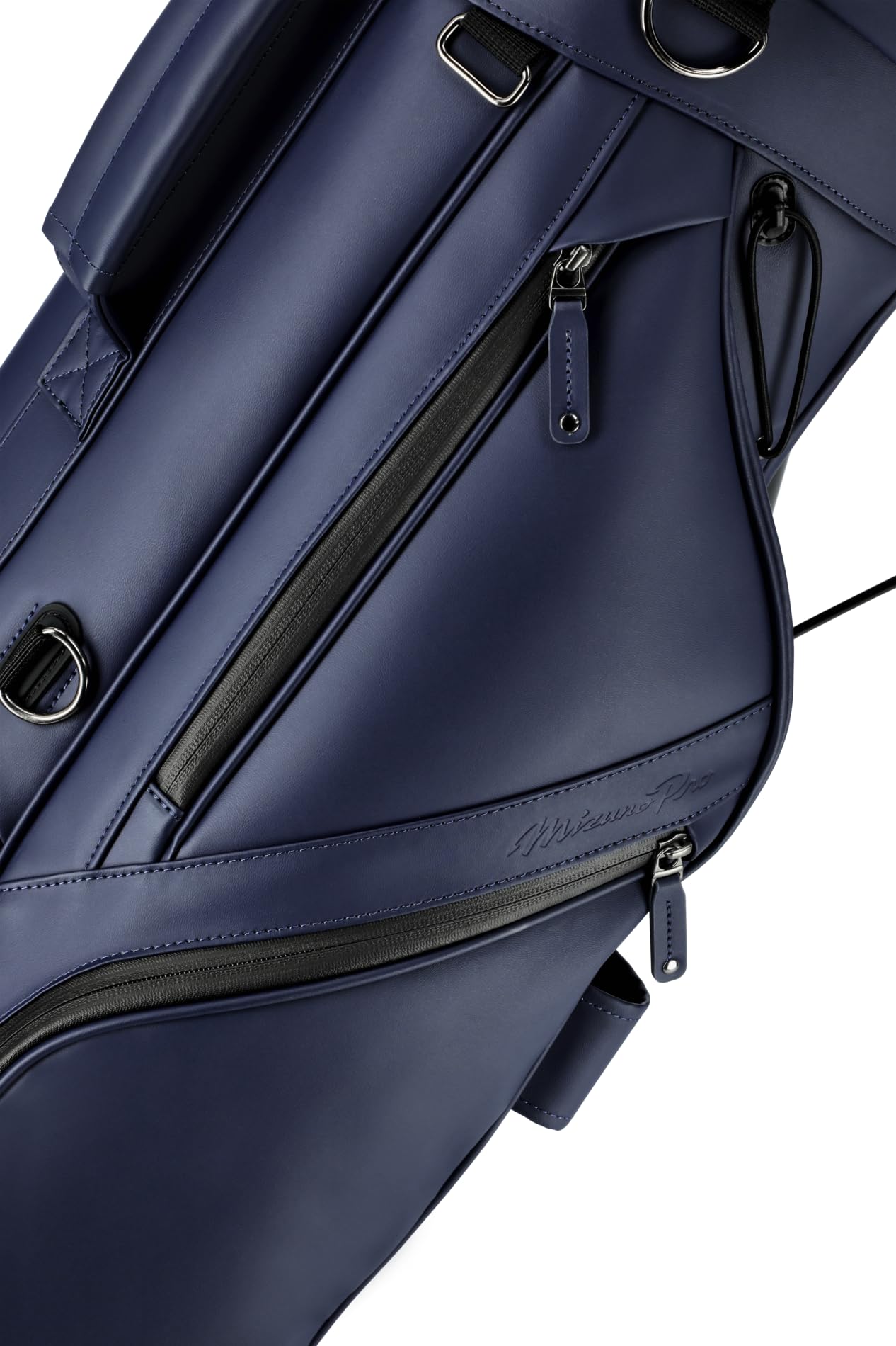 Close-up of a navy blue golf bag with visible brand logo.