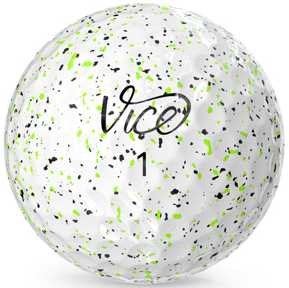 White golf ball with green and black speckles and 'Vice' branding on a white background