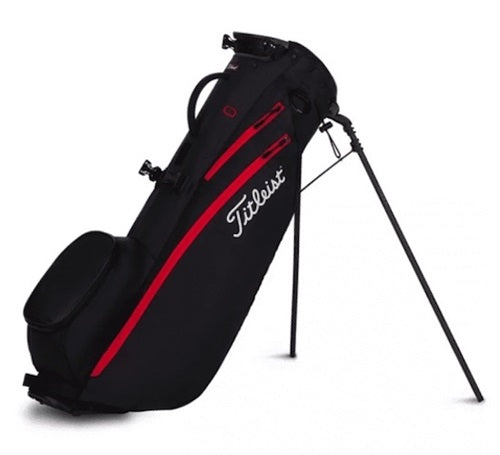 Black golf bag with red accents and Titleist logo on a white background