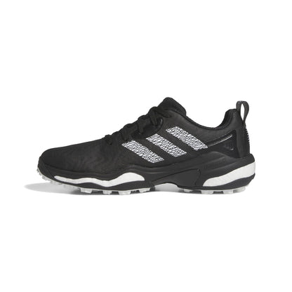 Black Adidas shoe with white sole on a white background