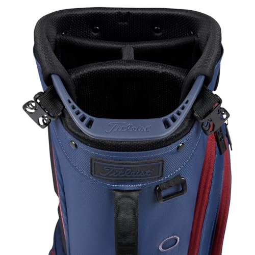 Blue golf bag with red strap on a white background