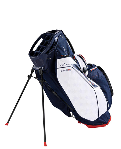 Navy and white golf bag with a club on a white background