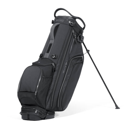 Black golf bag with stand on a white background