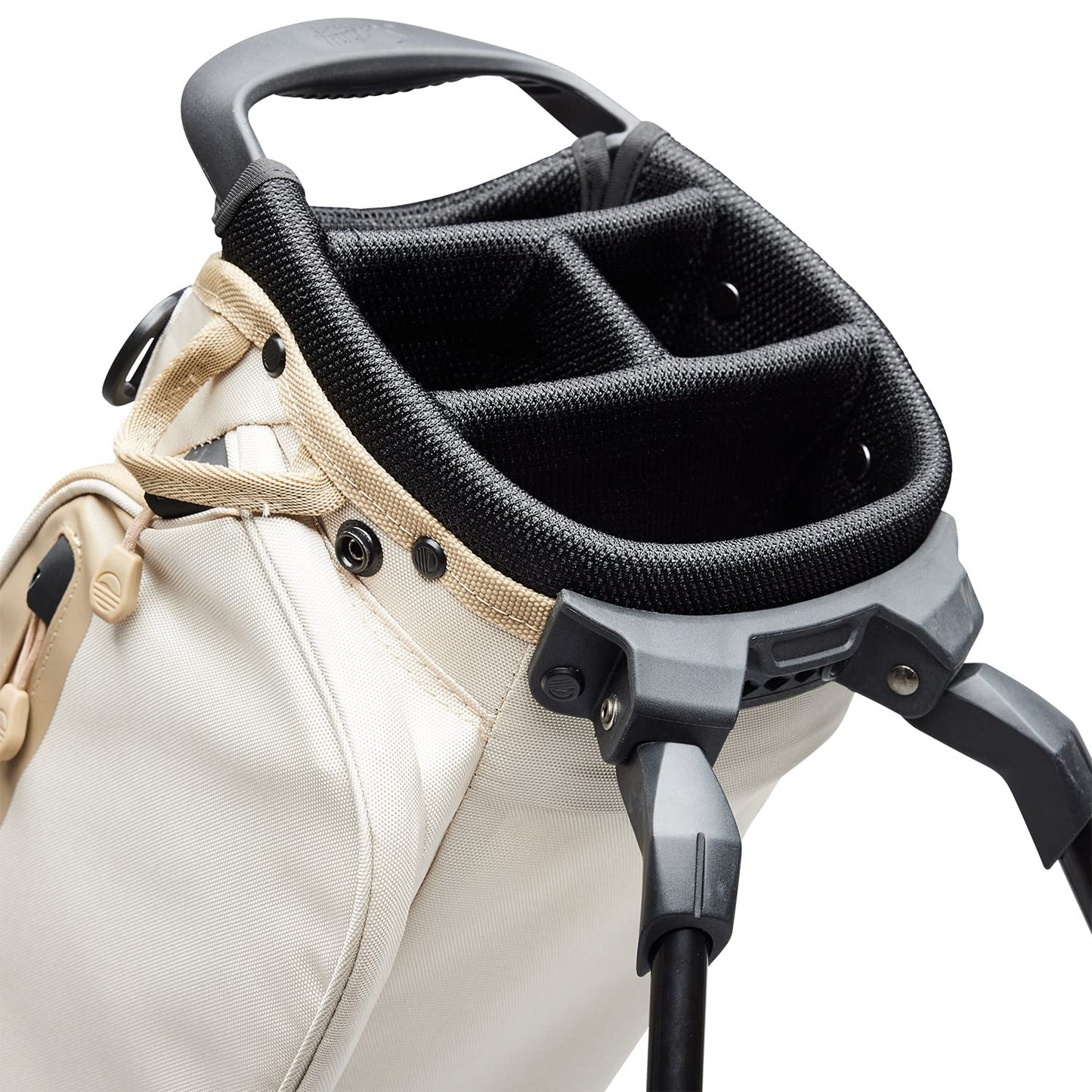 Close-up of a golf bag with a black headcover on a white background
