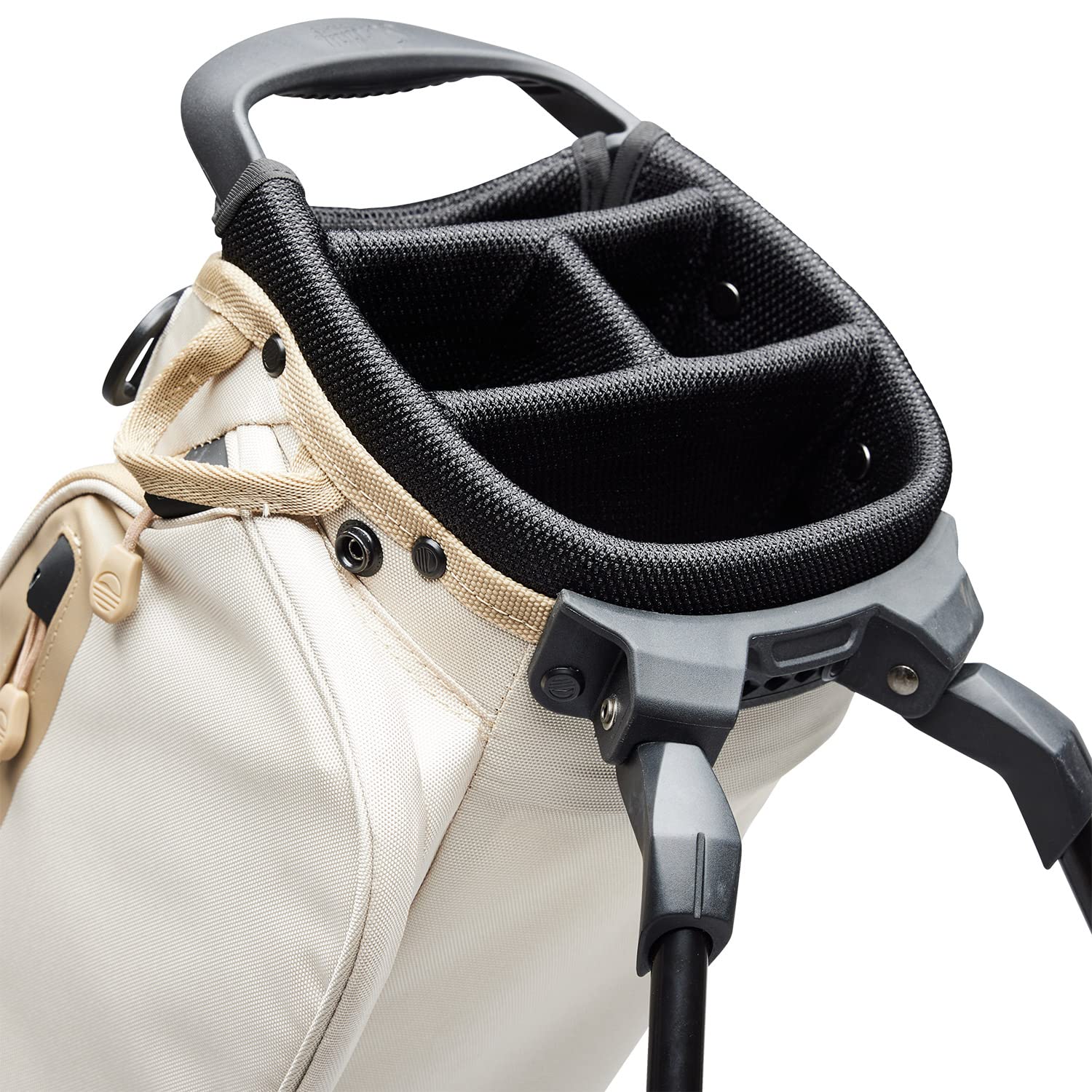 Close-up of a golf bag with a black headcover on a white background