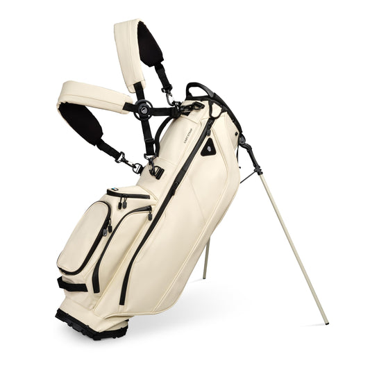 Beige golf bag with black accents on a white background