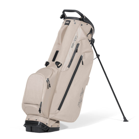 Beige golf bag with black accents on a white background