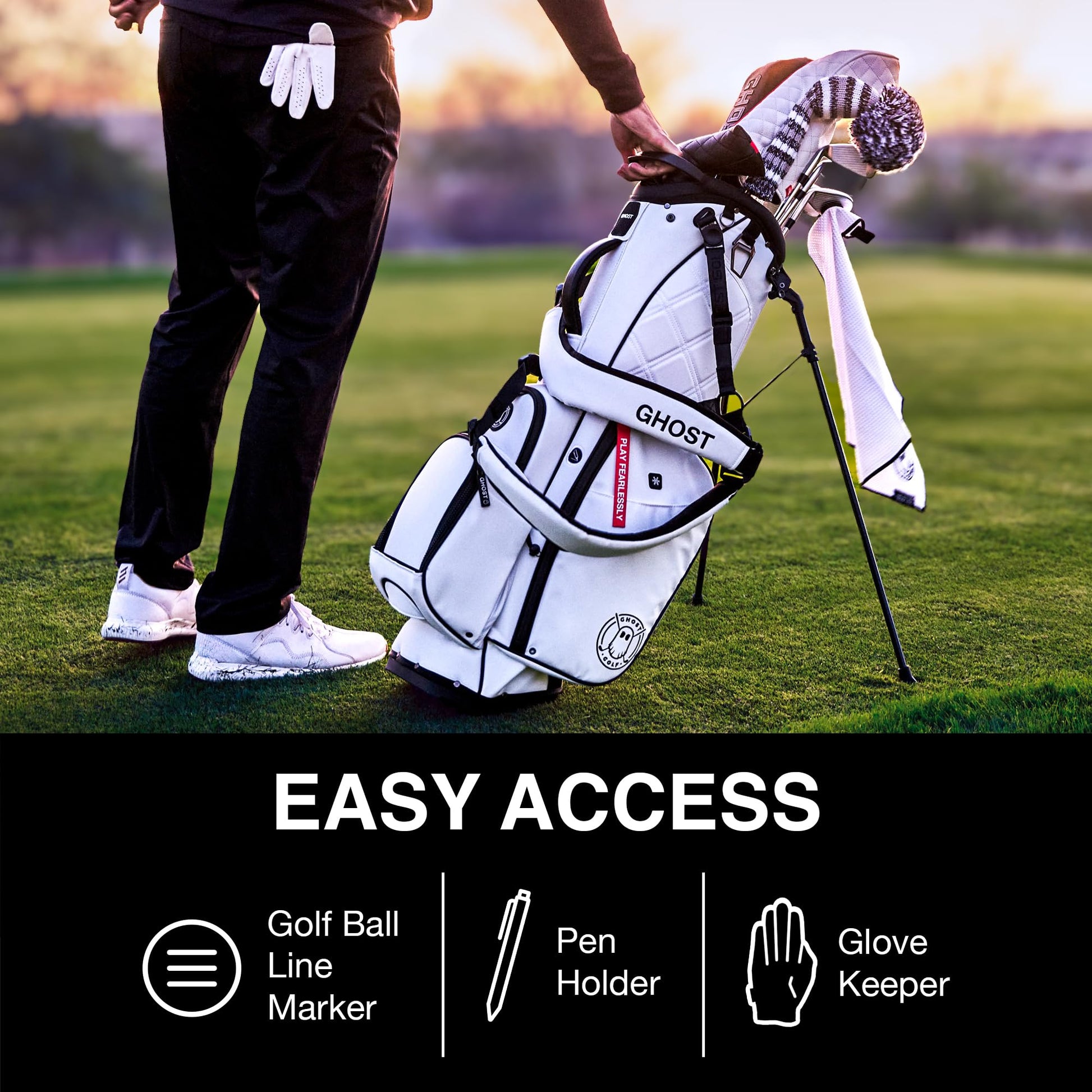 Golf bag with accessories on a golf course, featuring the brand 'Ghost'.