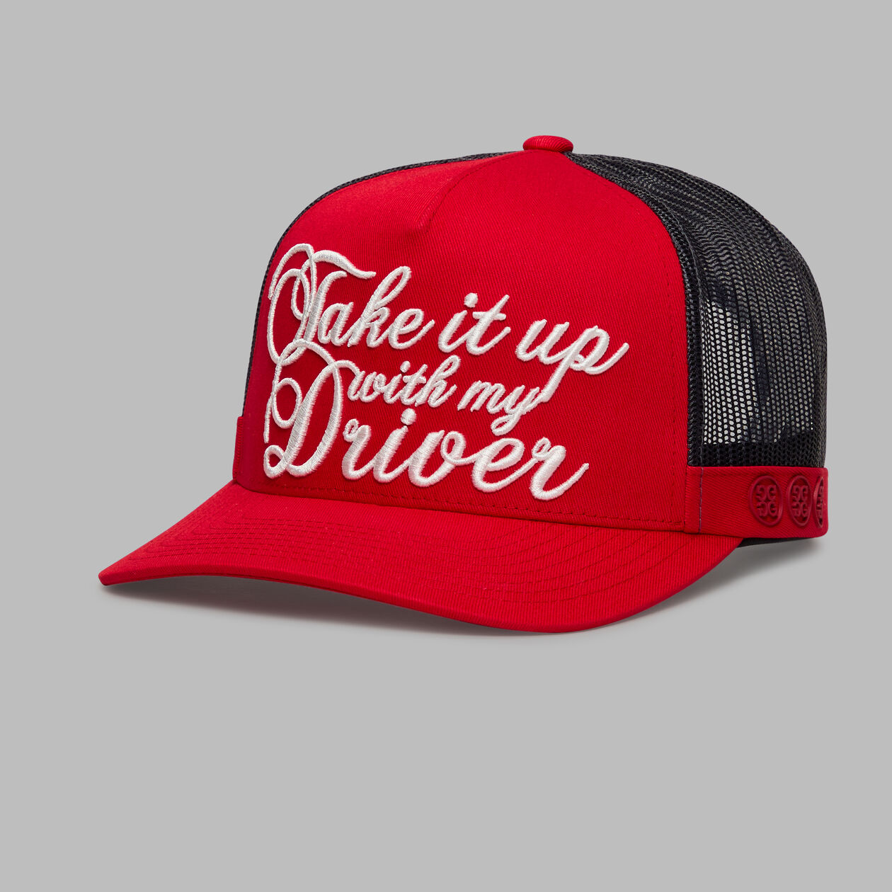 A product image of a GFore Take It Up With My Driver Trucker Hat - Lava on a white background