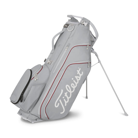 A product image of a Titleist Hybrid 14 Stand Bag - Cool Gray / Crimson / White on a white background